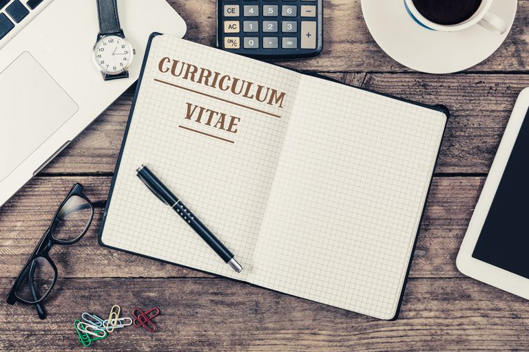 A photo of a notepad that says curriculum vitae